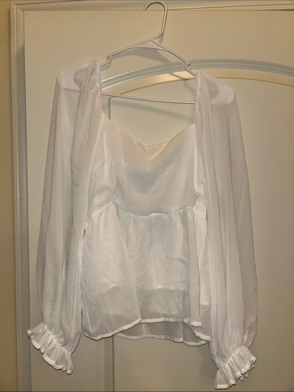 ARULA White Sheer Peplum Blouse with Ruffled Cuffs